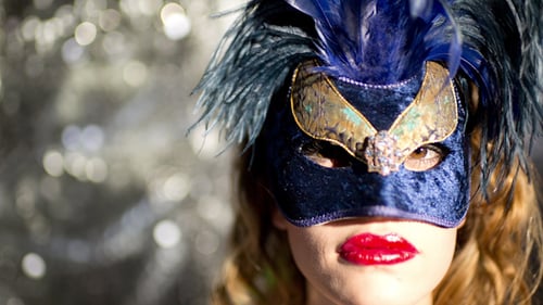 Woman Wearing Fancy Feathered Masquerade Mask