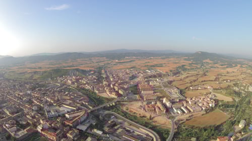 Aerial View of Town, Mountains in the Distance