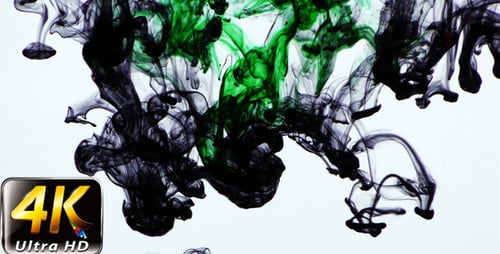 Black and Green Ink Swirling in Water