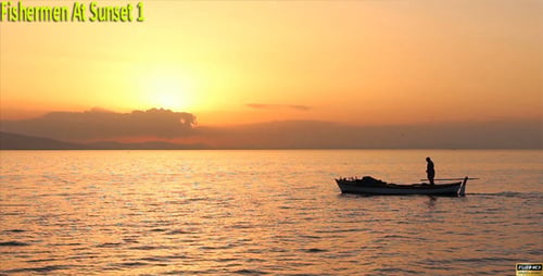 Fisherman Rows Boat on Calm Sea at Sunrise