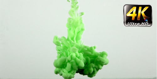 Bright Green Paint Swirling in Clear Water