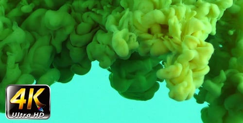 Vibrant Green and Yellow Ink Dissolving in Water