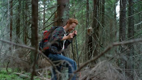 Smiling Guy Trekking Woods in Summer Time