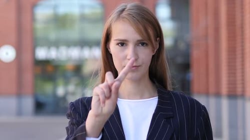 Young Woman Gesturing No With Finger