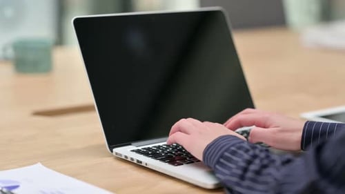 Typing on Laptop