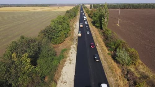 Road Rollers Building the New Asphalt Road. Traffic Motion
