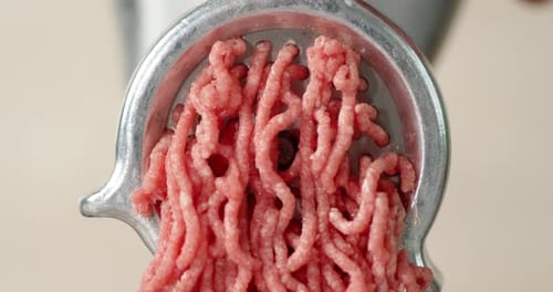 Cooking Raw Minced Meat at Home on a Meat Grinder