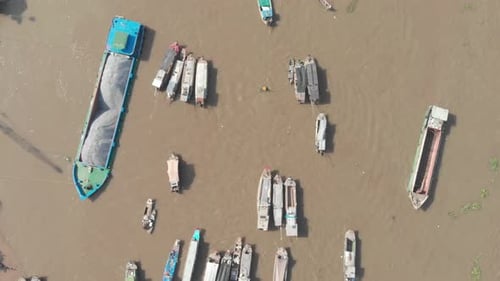 Aerial: rotating panorama over Cai Rang floating market Can Tho Vietnam