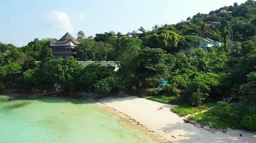 Wide birds eye travel shot of a summer white paradise sand beach and aqua blue water background in c