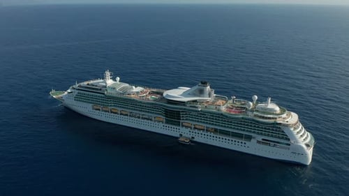 Aerial View of Cruise Ship at Sea on Sunny Day