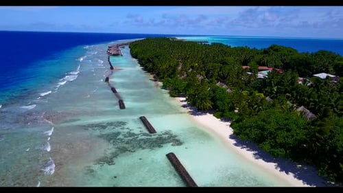 Aerial drone seascape of perfect island beach lifestyle by blue water with white sand background of