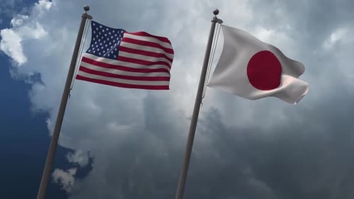 United States and Japan Flags Waving Together