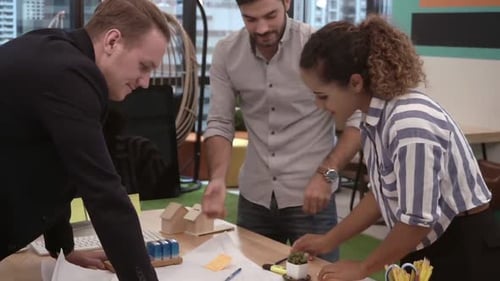 Creative Business People Group Having Conversation at Office Desk in Workplace