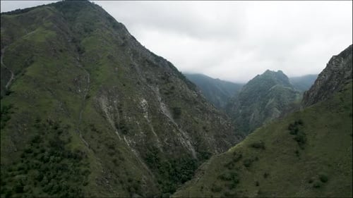 Green Mountain Slopes Under an Overcast Sky