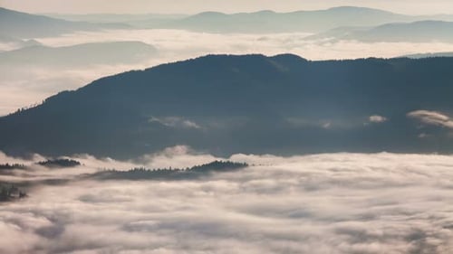 Misty Dawn in the Mountains. Beautiful Autumn Landscape