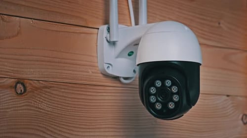 Rotating Security Camera Mounted Indoors