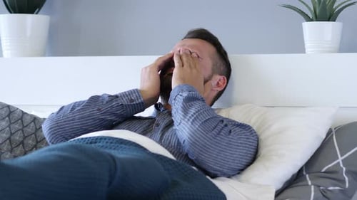 Crying Sad Beard Man Lying in Bed