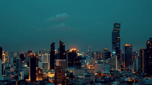Time Lapse Night Cityscape and Highrise Buildings in Metropolis City Center