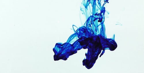 Blue Ink Spreading Slowly in Water