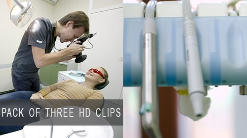 Man Taking Pictures of Woman in Dental Office