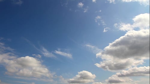 White Clouds Drifting in a Blue Sky