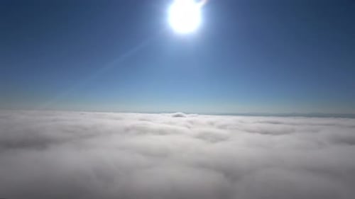 Majestic Aerial View of White Clouds and Blue Sky