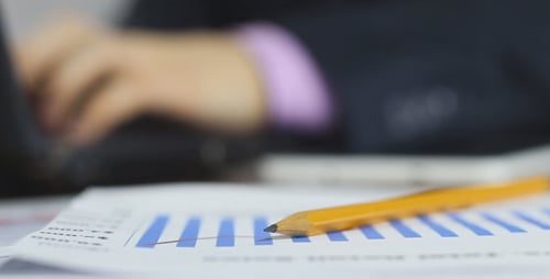 Close Up of Financial Paperwork in an Office