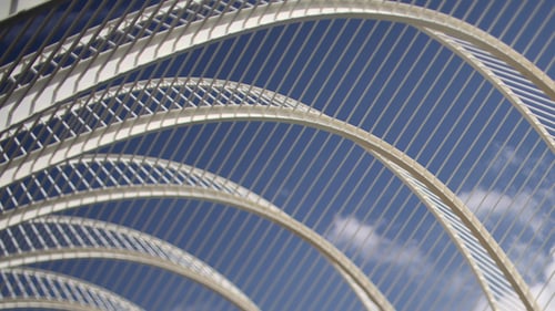 Abstract Architectural Arches Against a Blue Sky