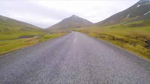 Driving in Iceland across beautiful countryside
