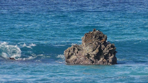 Waves Crashing on Stone Beach