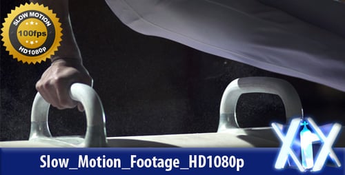 Gymnast Does Gymnastics on the Pommel Horse Indoors