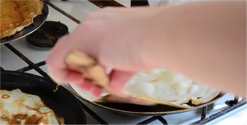 Cooking Pancake on Frying Pan at Home