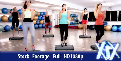 Women Perform Step Aerobics Routine in Gym