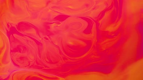 Flüssiger Hintergrund orange und rote Farbe
