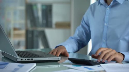 Office Manager Working at Company Sales Report, Typing Data on Laptop, Project