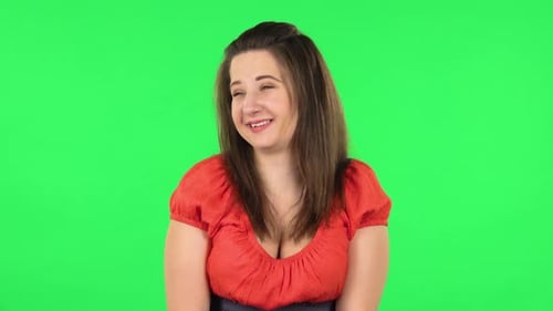 Expressive Young Woman Talking on Green Screen