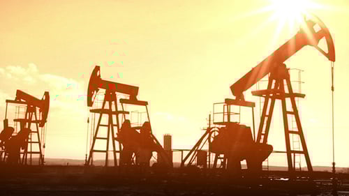 Oil Pump Jacks at Sunset Silhouette