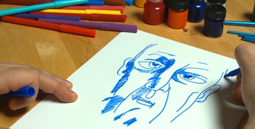 Quick Drawing on Paper of a Man's Head