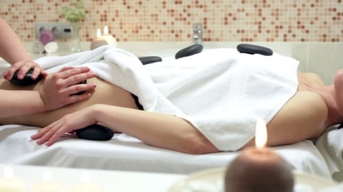 Woman Enjoying Stone Therapy