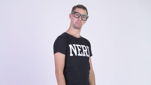 Studio Shot of Nerd Man Looking Confused