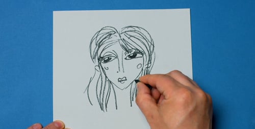 Artist Hand Drawing Portrait Sketch with Charcoal