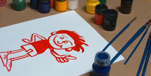 The Man Draws a Sketch of The Man in Red ink