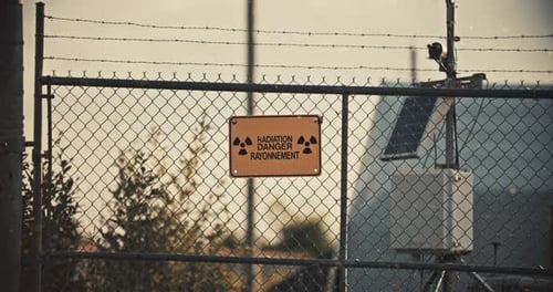 Radiation Danger Sign on Chain Link Fence