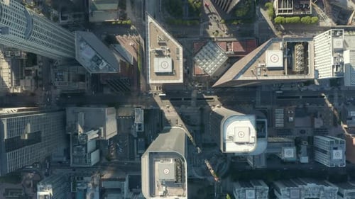 AERIAL: Slow Lowering Birds Eye View Flight Over Downtown Los Angeles California Grand Avenue in