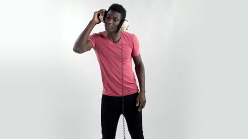 Man Dancing with Headphones on White Background