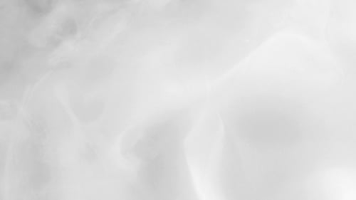 Abstract Motion Background of Swirling White Wisps