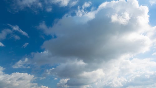Dynamic Clouds Time-Lapse in a Blue Sky