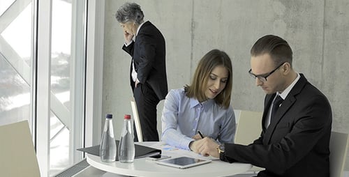 Business People Working and Joking in Modern Office