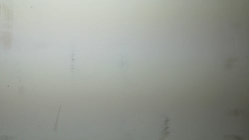 Hand Patching Up Wall With Drywall Compound