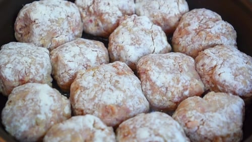 Close Up Of Frying Pan With Meatballs
